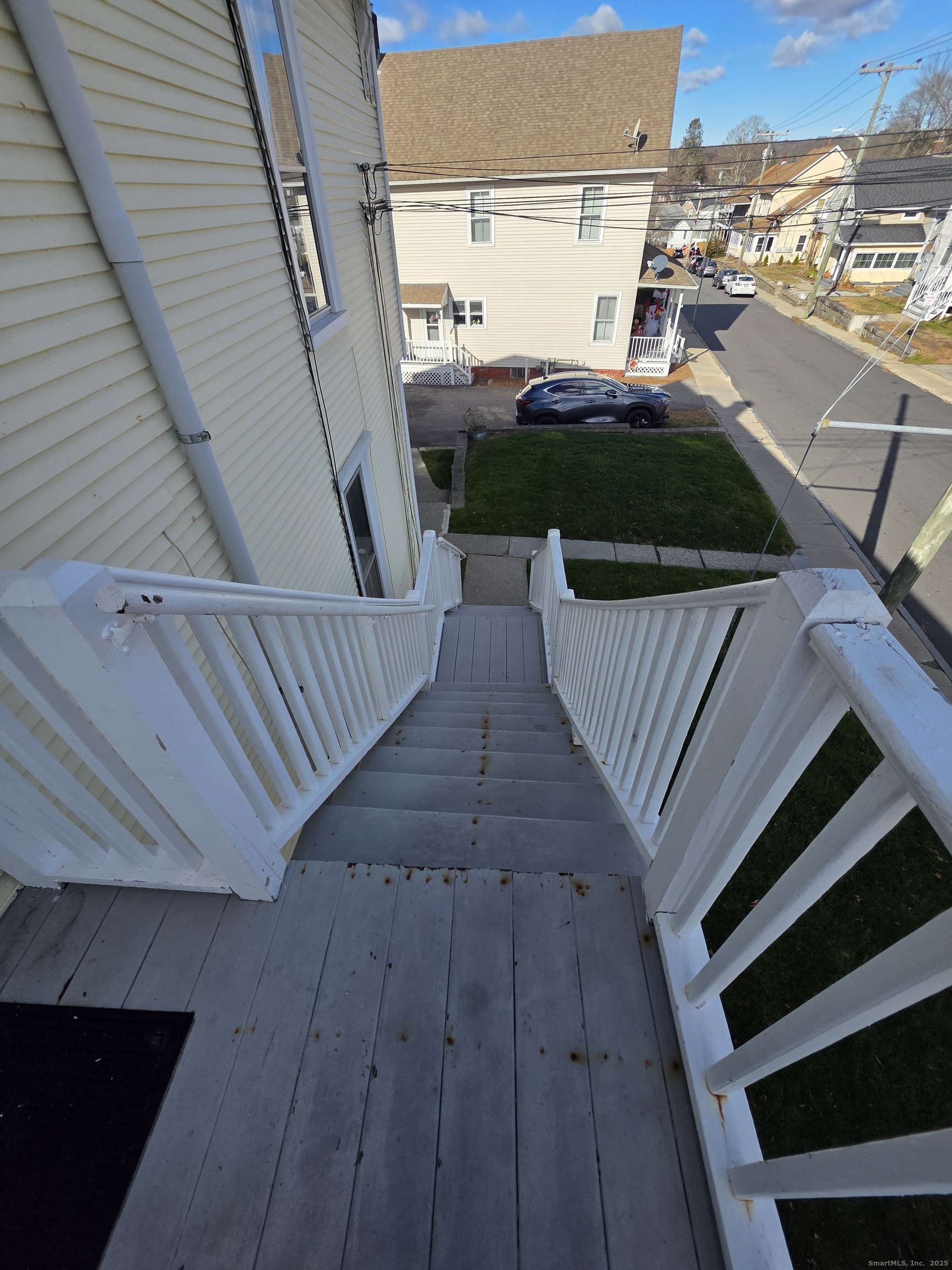 110 Main Street Griswold, CT 06351 - Photo 31 of 32 a view of a balcony with wooden floor