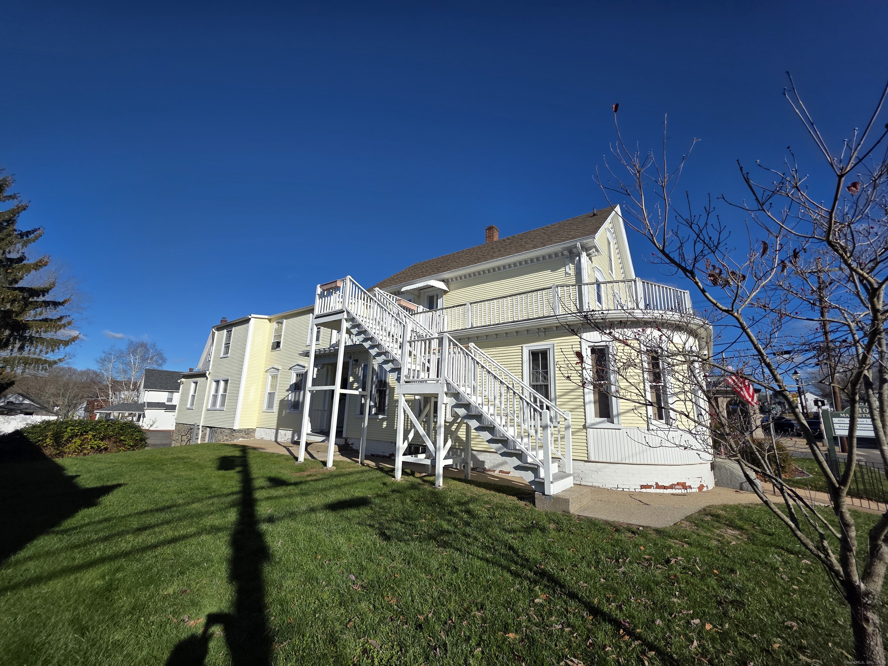 110 Main Street Griswold, CT 06351 - Photo 4 of 32 a view of a house with a yard