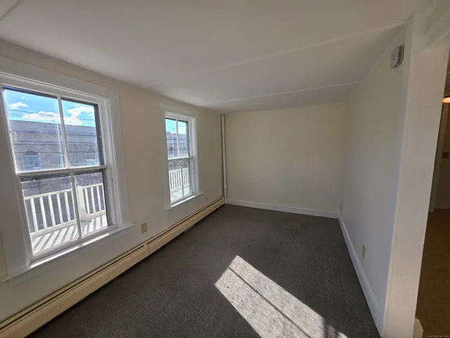 a view of an empty room and window