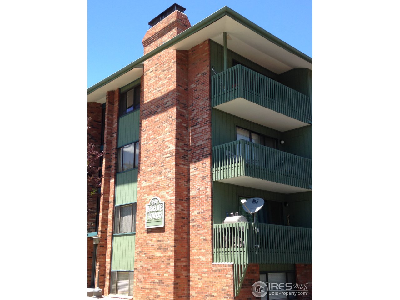 2141 Baseline Road, Unit 23 Boulder, CO 80302 - Photo 1 of 13 a front view of a house with glass windows