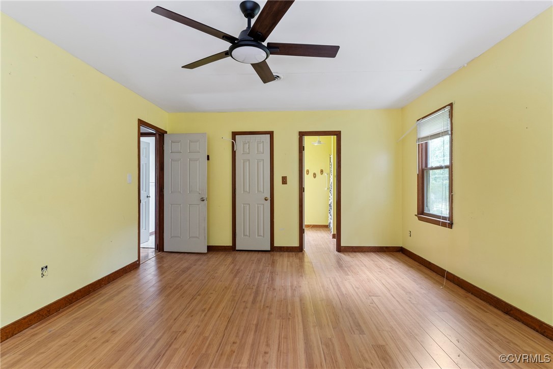 3125 Nahant Road Midlothian, VA 23112 - Photo 18 of 36 a view of an empty room with wooden floor and a window