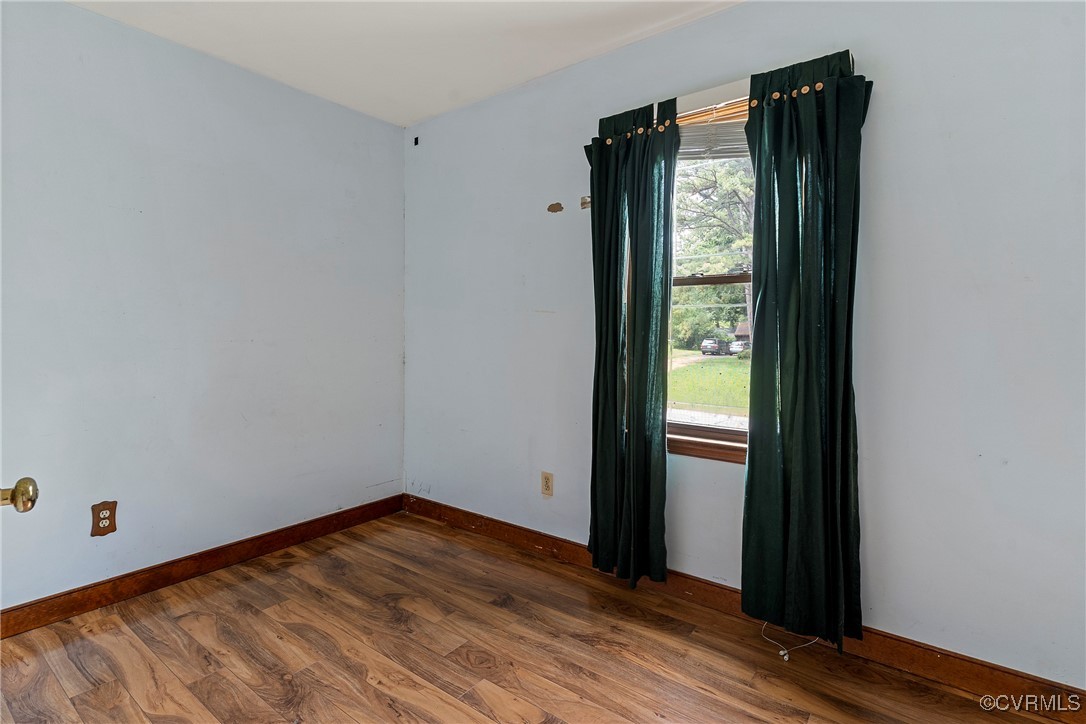 3125 Nahant Road Midlothian, VA 23112 - Photo 21 of 36 a view of empty room with wooden floor and fan