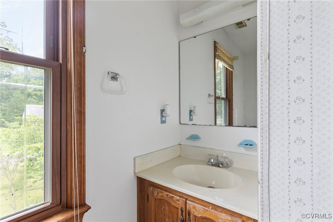 3125 Nahant Road Midlothian, VA 23112 - Photo 25 of 36 a bathroom with a sink and a mirror