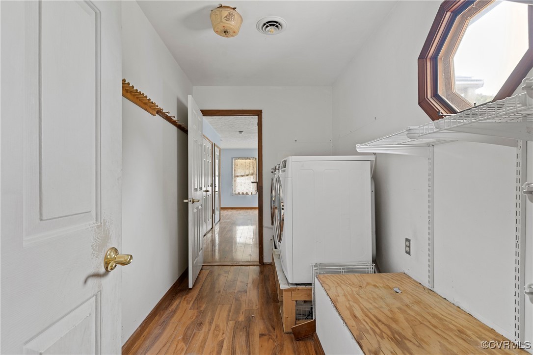 3125 Nahant Road Midlothian, VA 23112 - Photo 26 of 36 a view of a room with wooden floor and a bathroom
