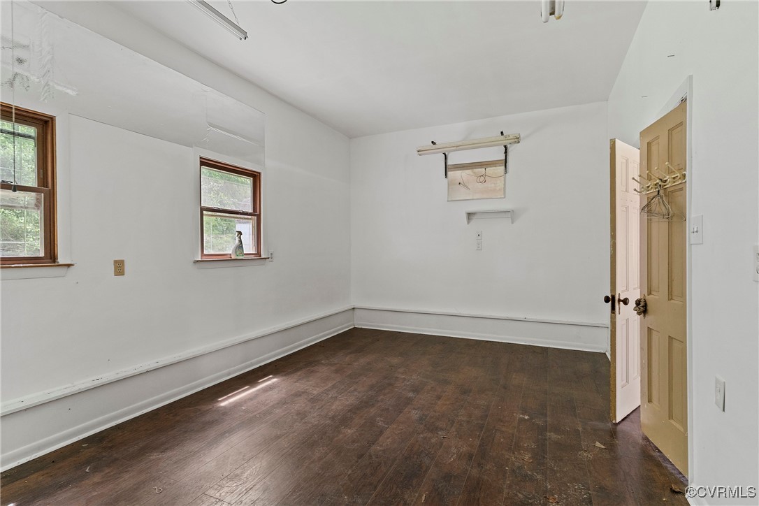 3125 Nahant Road Midlothian, VA 23112 - Photo 35 of 36 a view of an empty room with a window and wooden floor