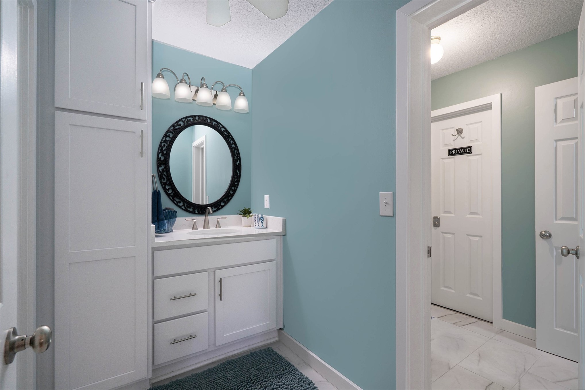 2892 Forest Ridge Drive, Unit V2 Fernandina Beach, FL 32034 - Photo 11 of 32 a room with a mirror on the dresser and a mirror