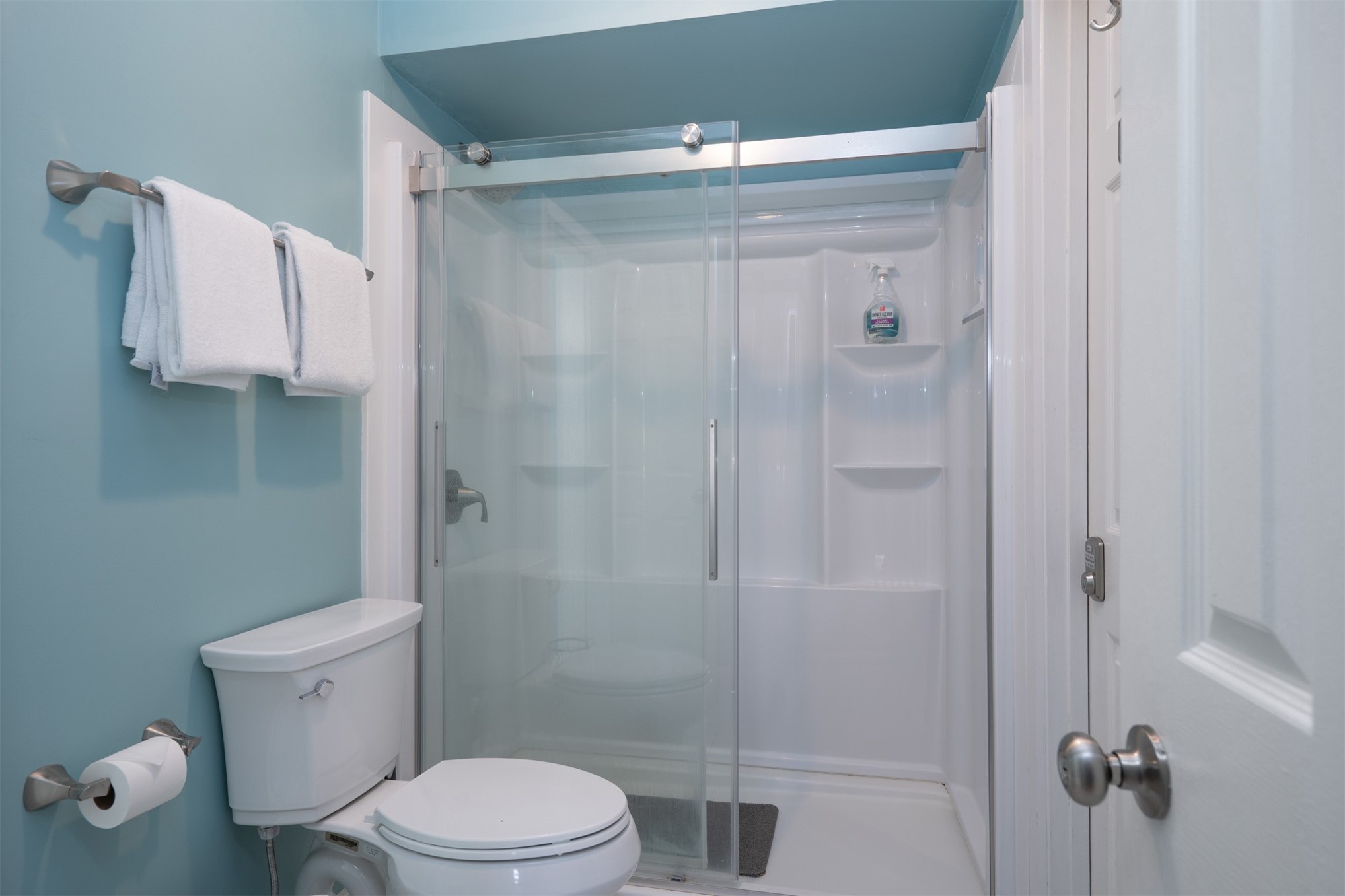 2892 Forest Ridge Drive, Unit V2 Fernandina Beach, FL 32034 - Photo 12 of 32 a white toilet sitting next to a bathroom sink