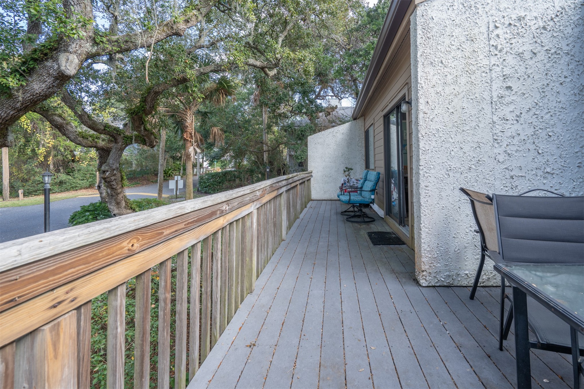 2892 Forest Ridge Drive, Unit V2 Fernandina Beach, FL 32034 - Photo 22 of 32 a view of balcony with furniture and wooden deck