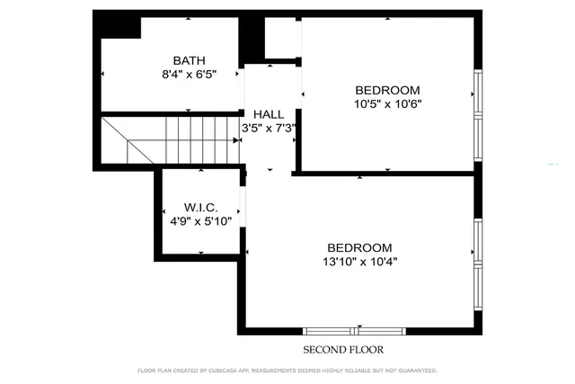 a view of a house with a wooden deck and a backyard