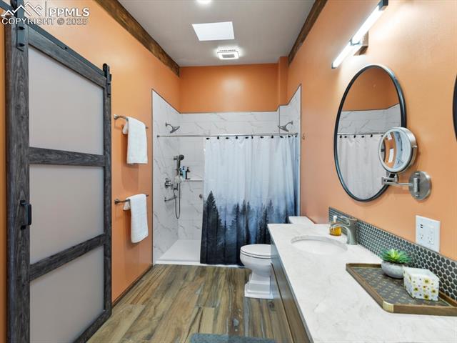 10530 Hungate Road Colorado Springs, CO 80908 - Photo 11 of 21 Double shower head, wheel chair accessible