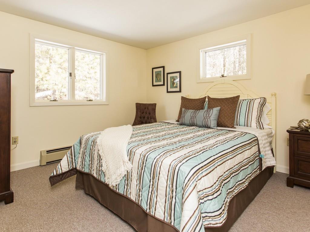 149 Black Point Road New Gloucester, ME 04260 - Photo 22 of 34 The Master Bedroom easily...