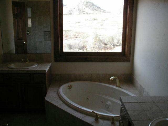 357 Faas Ranch Road New Castle, CO 81647 - Photo 3 of 4 a bathroom with a sink and a window