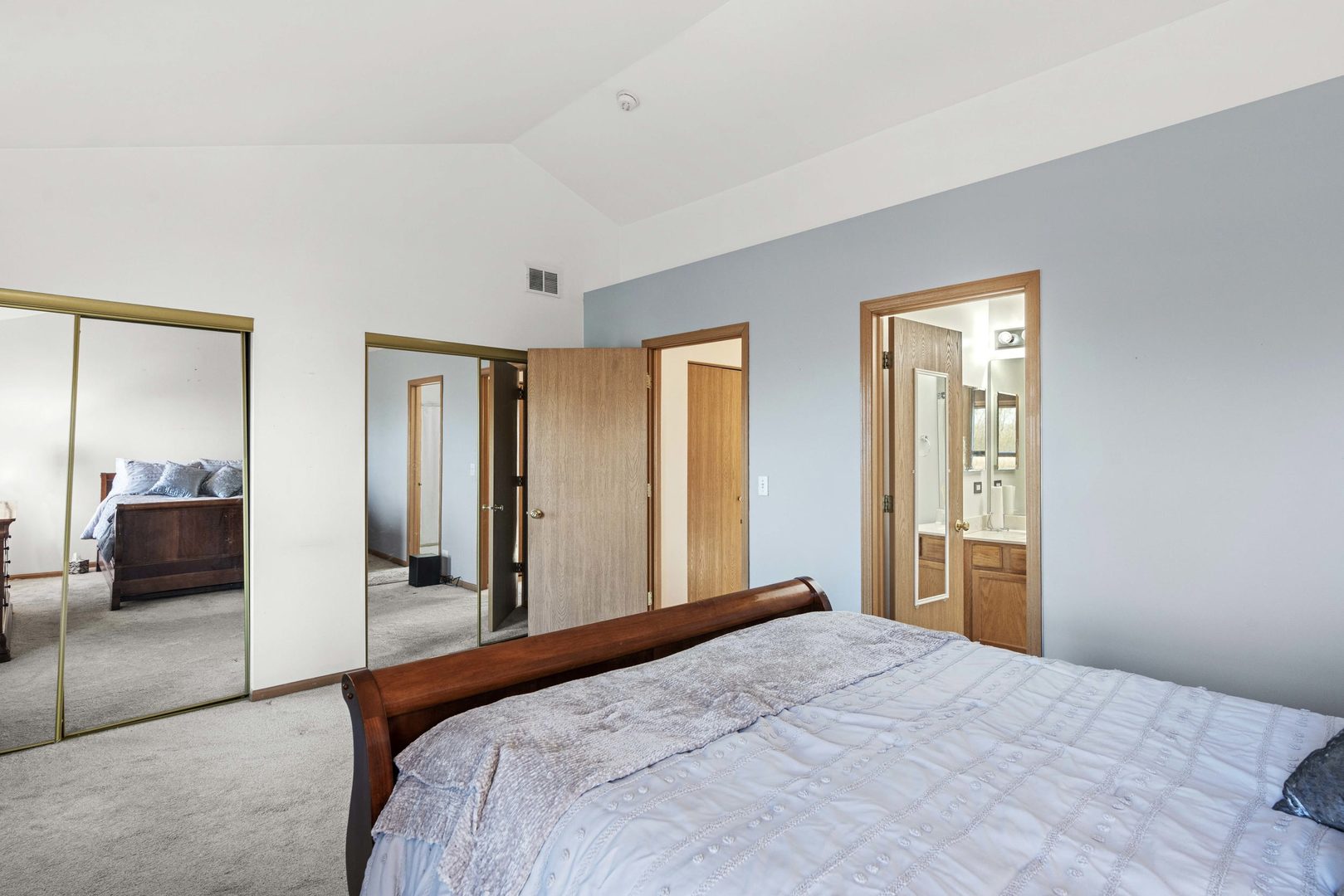 21628 Dogwood Road, Unit 1203 Matteson, IL 60443 - Photo 19 of 20 a bedroom with a bed and a couch