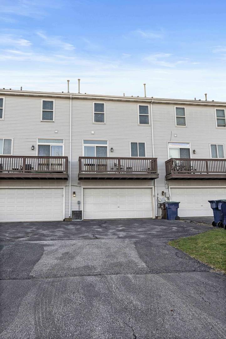 21628 Dogwood Road, Unit 1203 Matteson, IL 60443 - Photo 3 of 20 a view of building with outdoor space