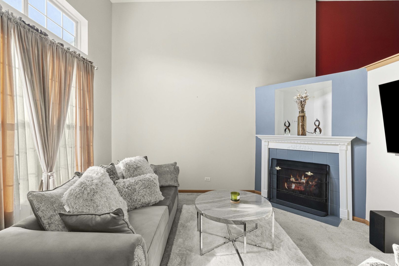 21628 Dogwood Road, Unit 1203 Matteson, IL 60443 - Photo 5 of 20 a living room with furniture and a fireplace