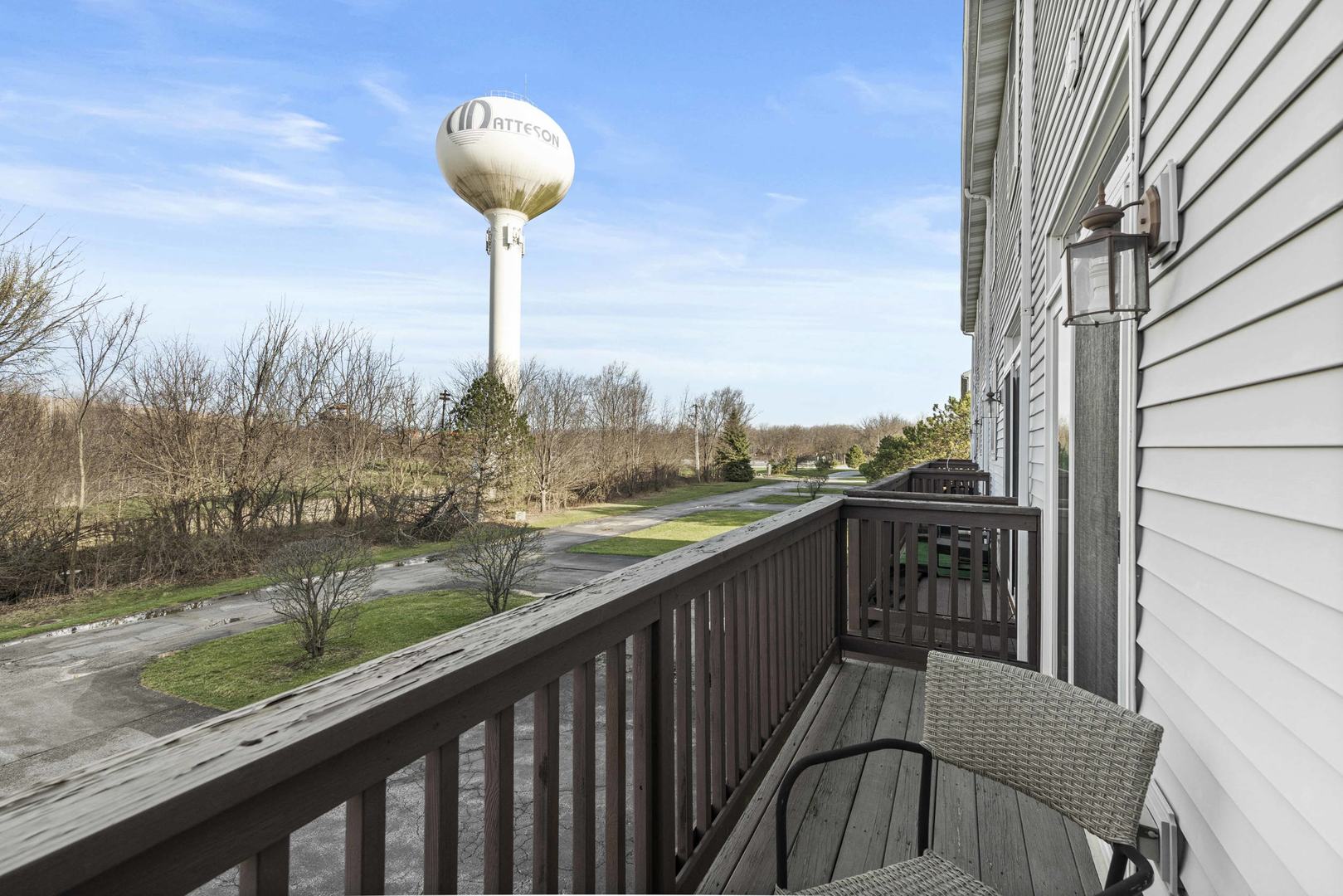 21628 Dogwood Road, Unit 1203 Matteson, IL 60443 - Photo 10 of 20 a view of a balcony with chair