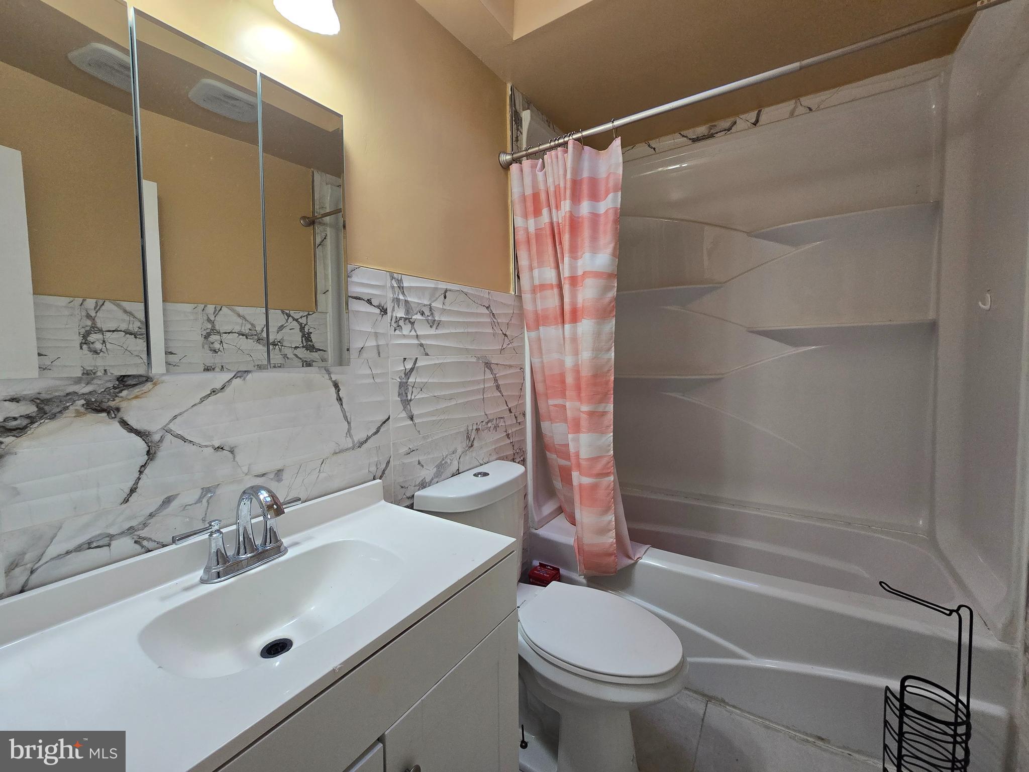 2118 Benson Street Philadelphia, PA 19152 - Photo 13 of 26 a bathroom with a sink toilet and shower