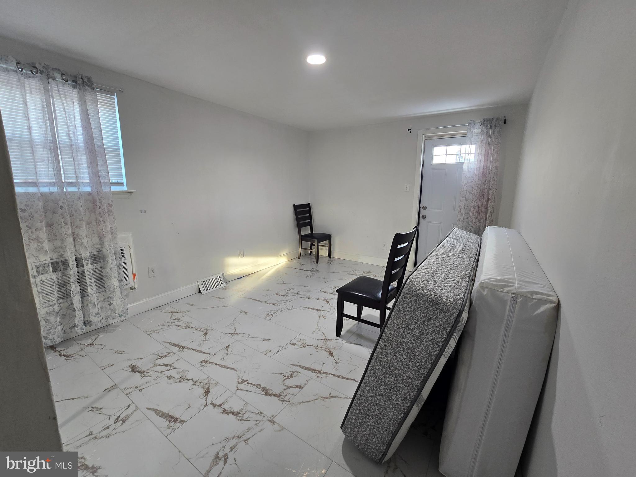 2118 Benson Street Philadelphia, PA 19152 - Photo 23 of 26 a view of a hallway with workspace