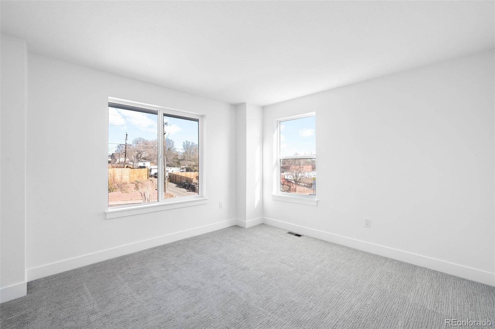 4660 West 9th Avenue Denver, CO 80204 - Photo 18 of 35 an empty room with windows