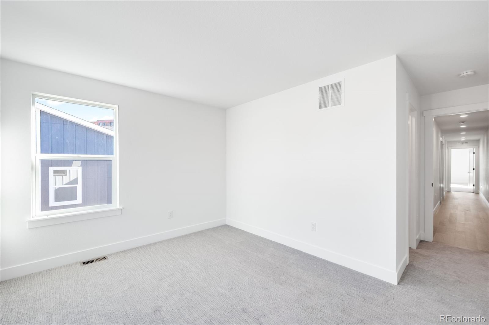 4660 West 9th Avenue Denver, CO 80204 - Photo 19 of 35 an empty room with a window