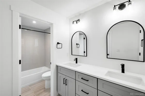 a bathroom with a shower and a toilet