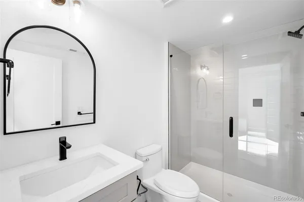 a view of a room with white walls