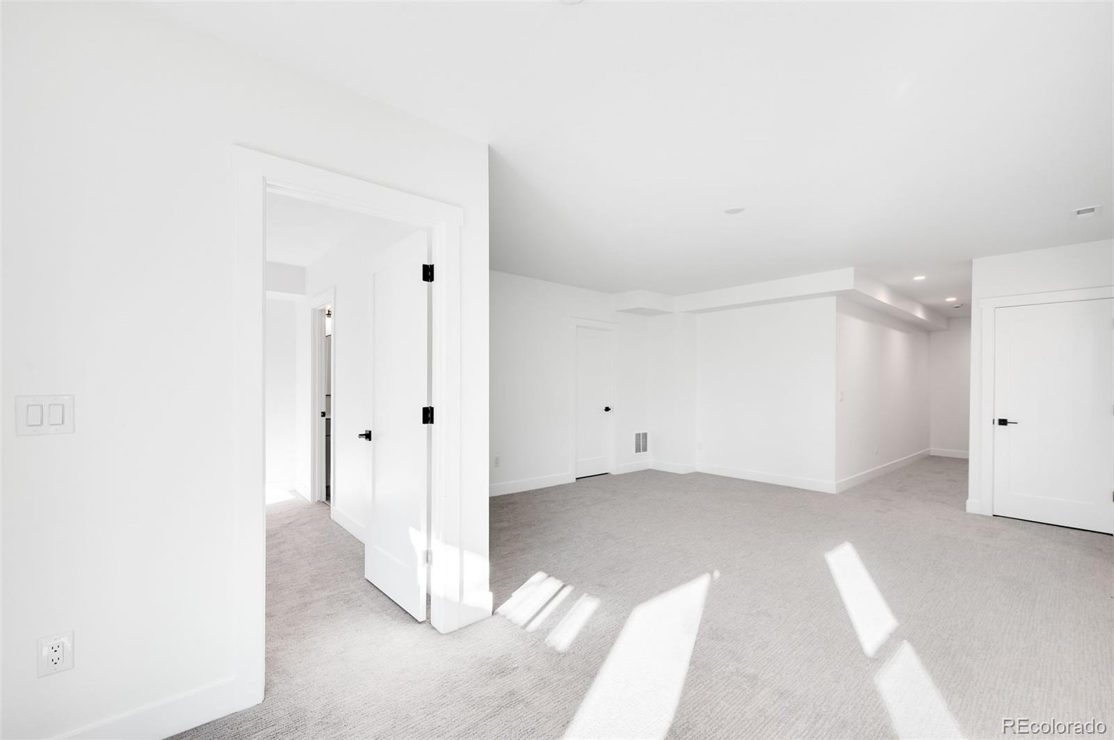 4660 West 9th Avenue Denver, CO 80204 - Photo 28 of 35 a view of a room with white walls