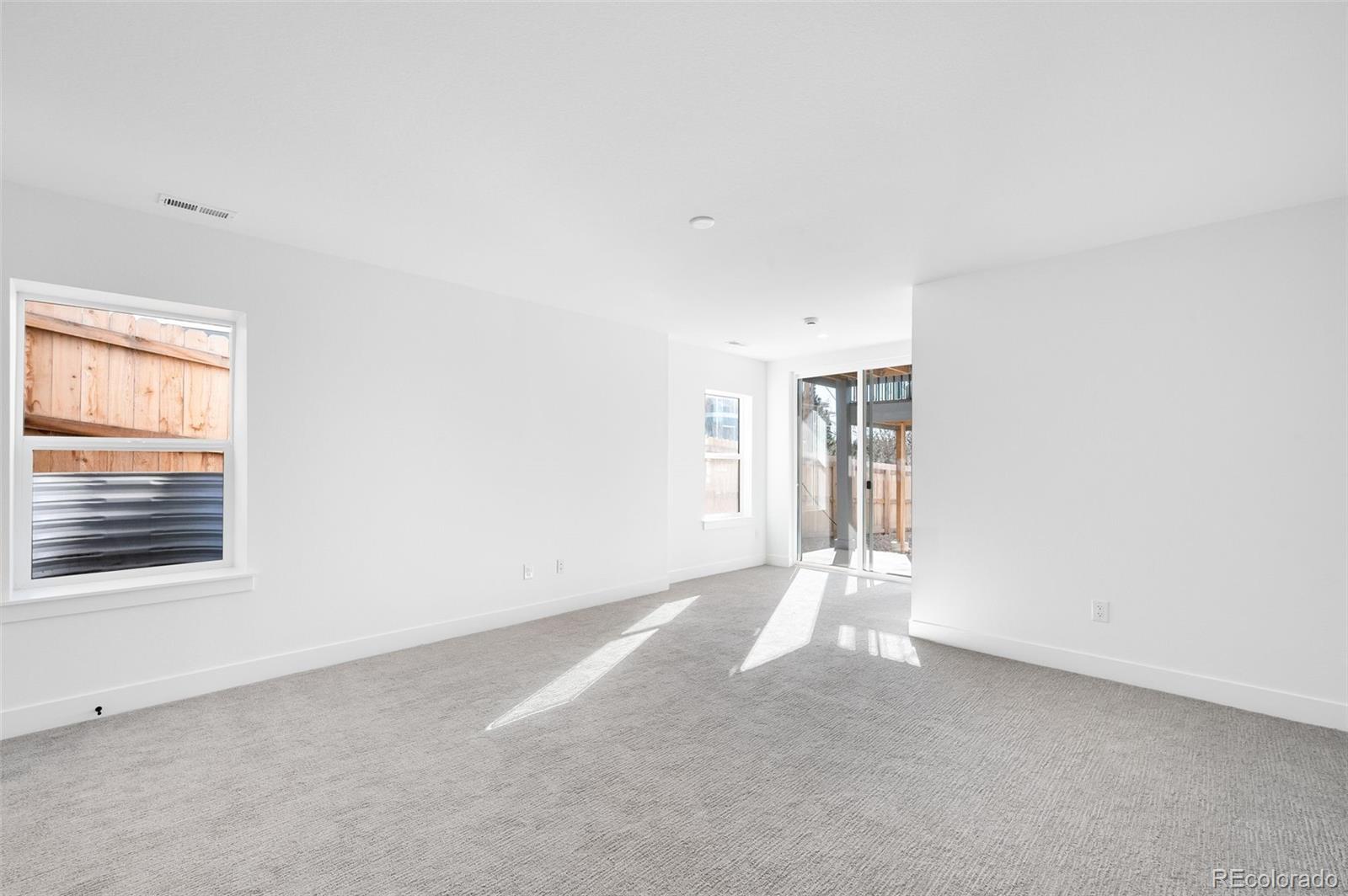 4660 West 9th Avenue Denver, CO 80204 - Photo 29 of 35 an empty room with windows