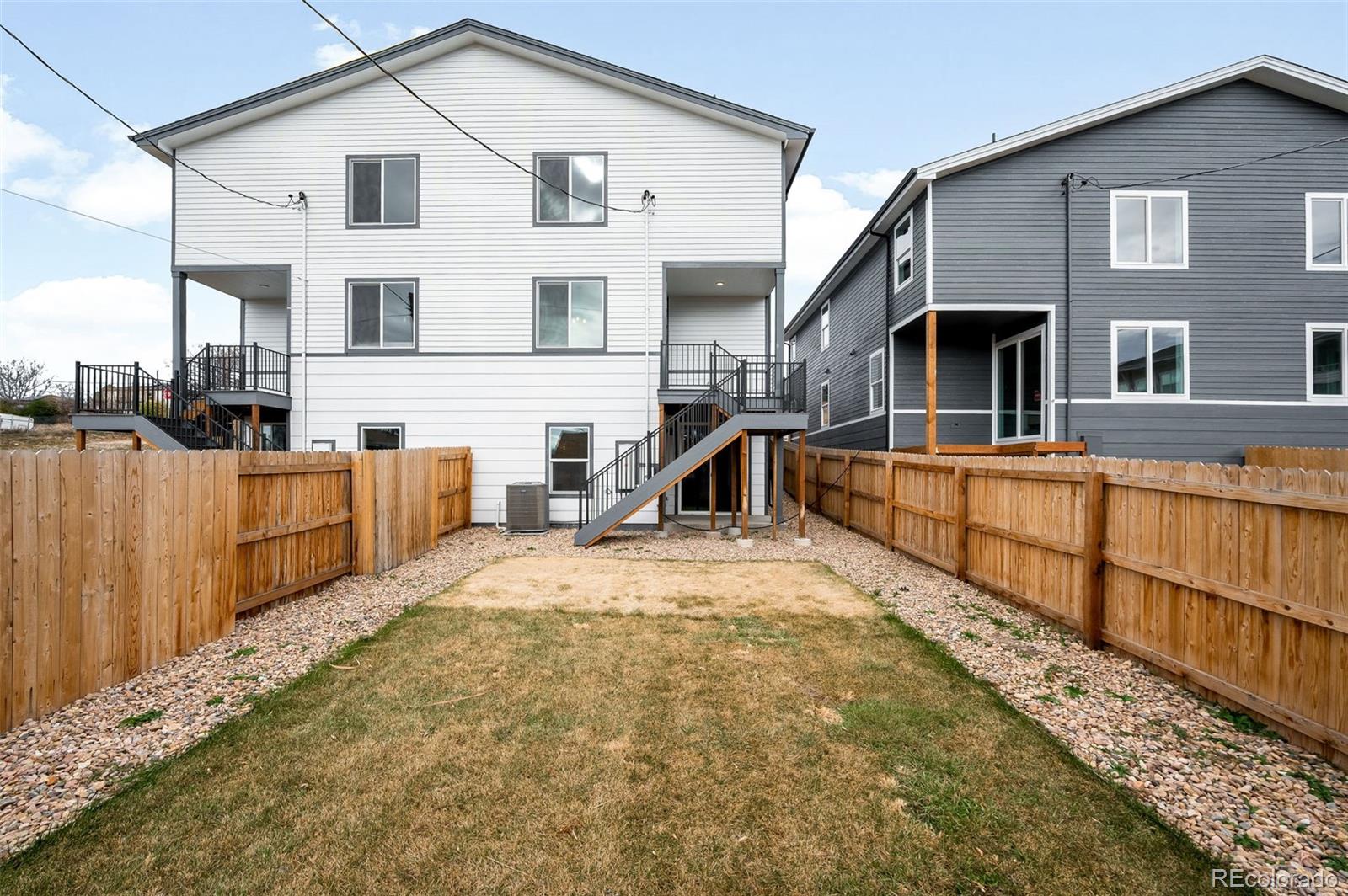 4660 West 9th Avenue Denver, CO 80204 - Photo 32 of 35 a view of a house with wooden fence
