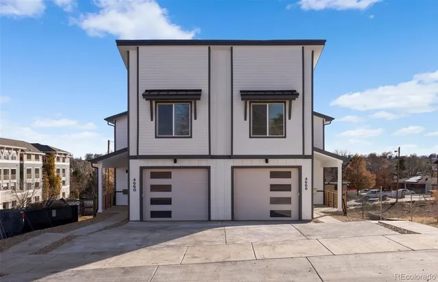 a view of a house with a garage