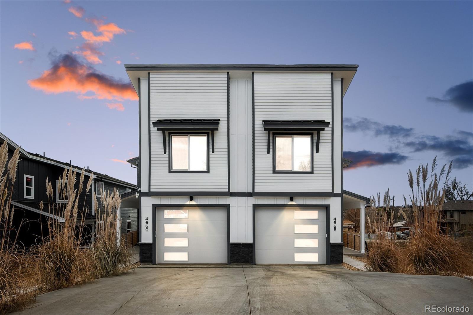 4660 West 9th Avenue Denver, CO 80204 - Photo 35 of 35 a front view of a house with a garage