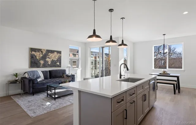 a kitchen with sink cabinets and window