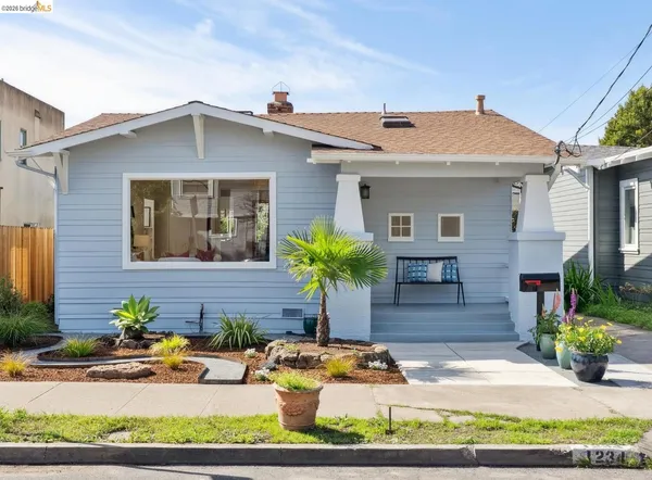 a front view of a house with porch