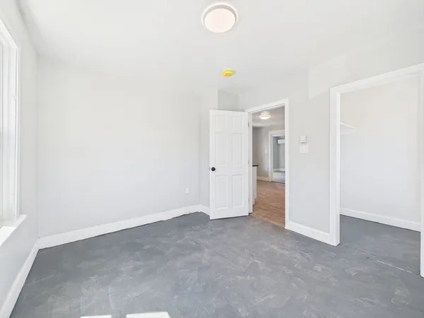 an empty room with an entryway