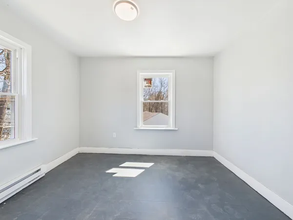 an empty room with a window