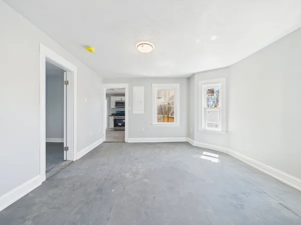 an empty room with windows