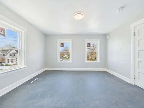 an empty room with windows