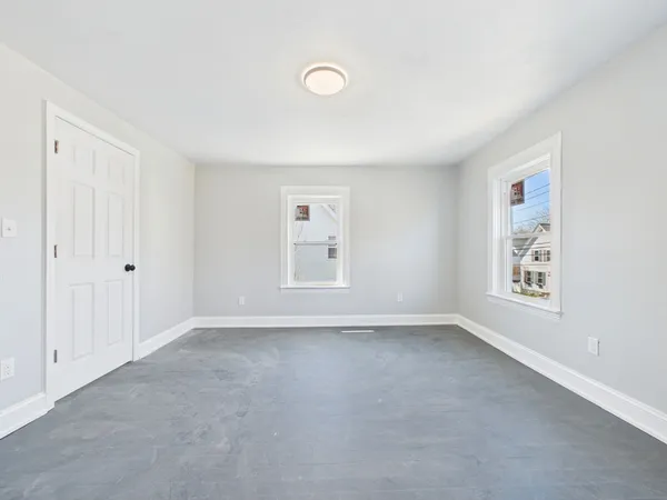 an empty room with windows