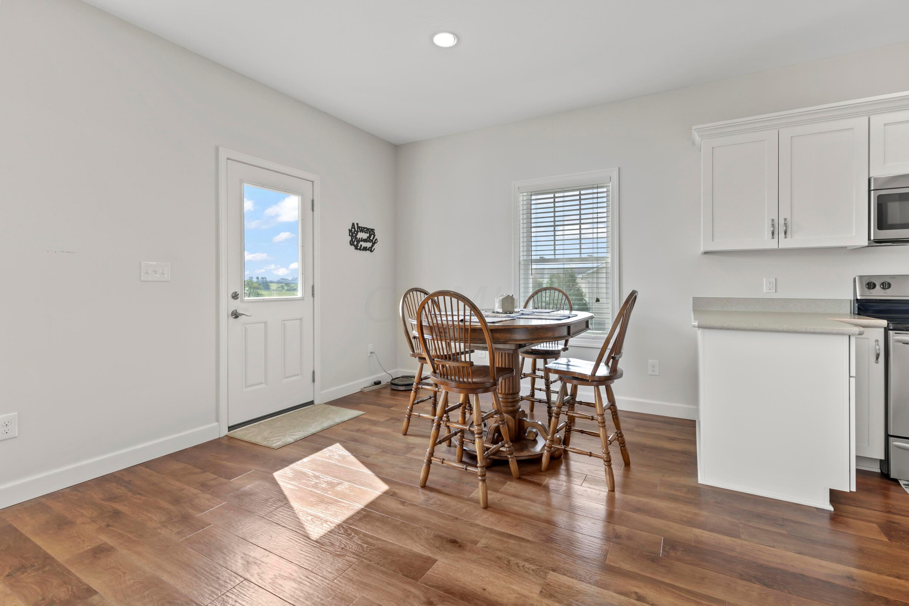 3644 Panhandle Road Delaware, OH 43015 - Photo 25 of 46 • High definition, “wood look”
laminate flooring
• Ivory painted walls
• Can lighting
• Atrium door to wood Deck and
Patio