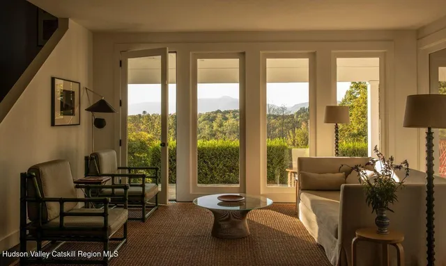 a room with furniture and a window