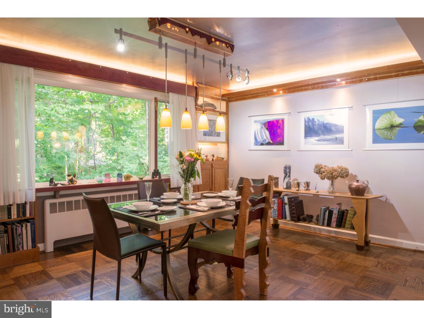 212 North Bent Road Wyncote, PA 19095 - Photo 14 of 25 a view of a dining room with furniture and chandelier