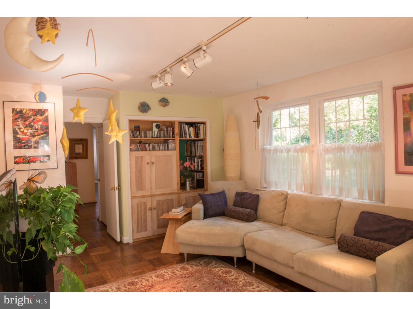212 North Bent Road Wyncote, PA 19095 - Photo 16 of 25 a living room with furniture and a large window