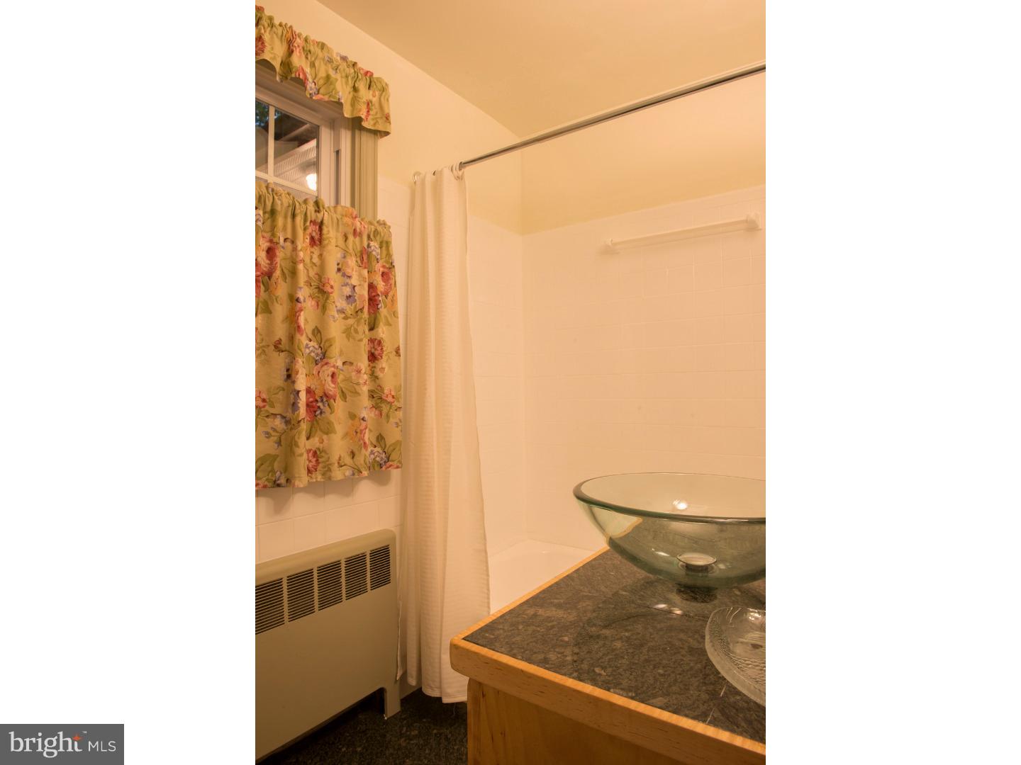 212 North Bent Road Wyncote, PA 19095 - Photo 17 of 25 a picture of a bathroom with a sink