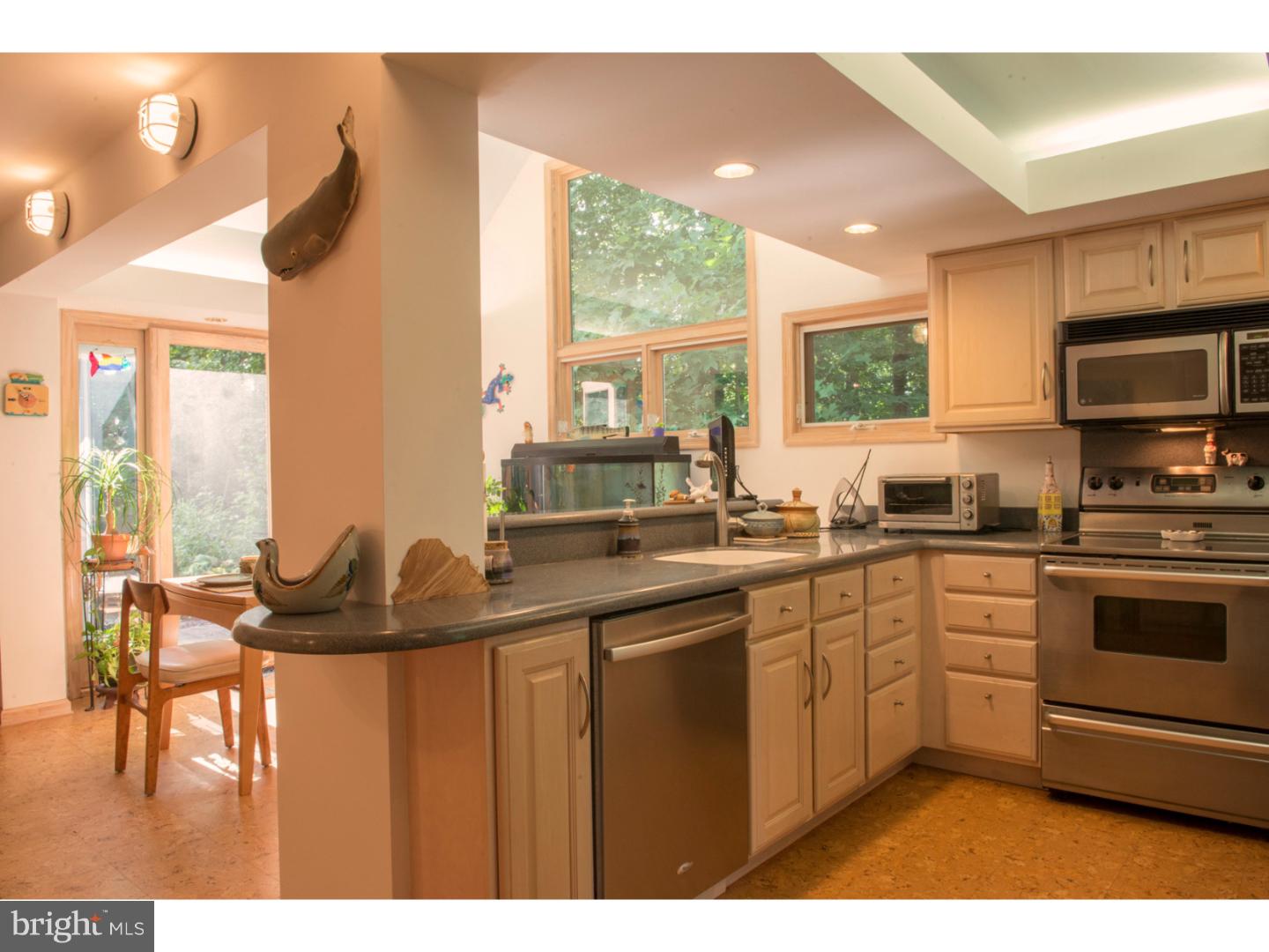 212 North Bent Road Wyncote, PA 19095 - Photo 5 of 25 a kitchen with a sink and cabinets