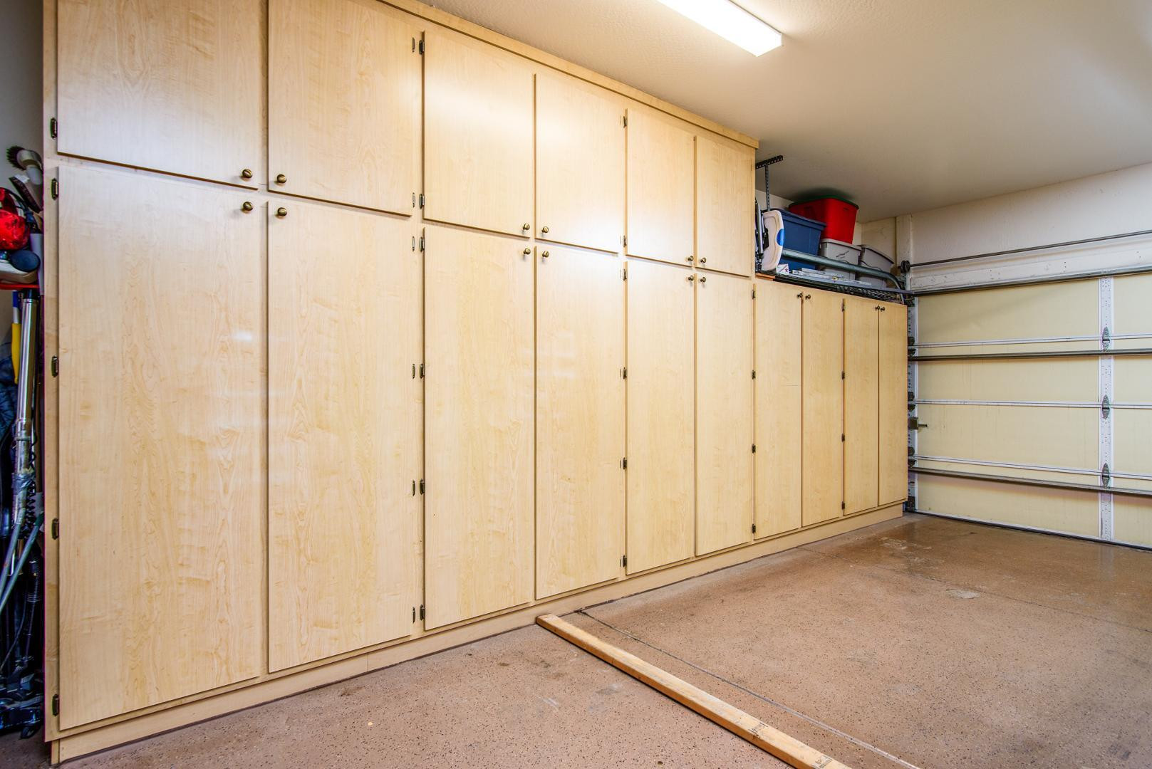42204 West Rummy Road Maricopa, AZ 85138 - Photo 32 of 79 a view of a storage & utility room with racks on the wall