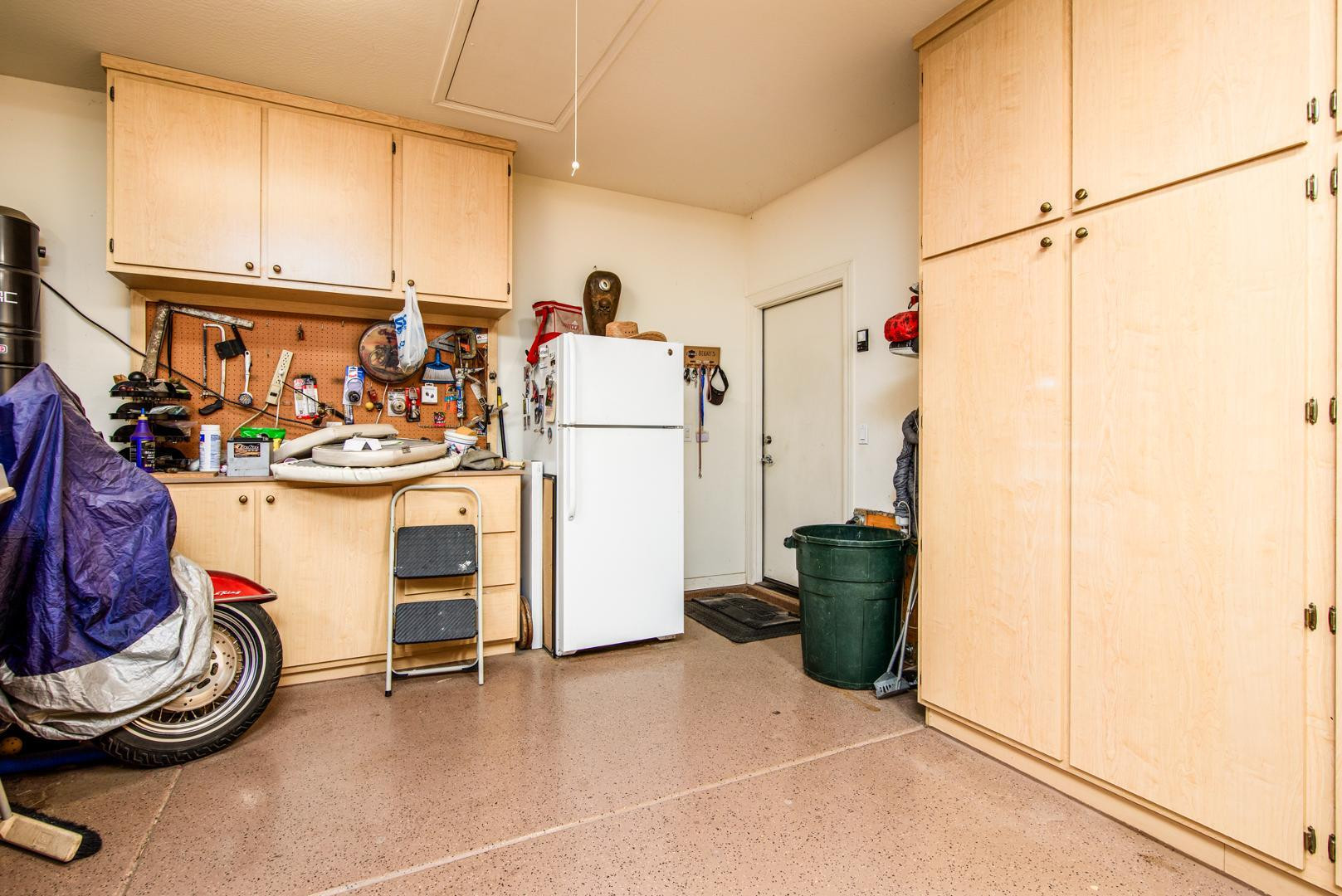 42204 West Rummy Road Maricopa, AZ 85138 - Photo 33 of 79 a view of a storage and utility room with washer and dryer