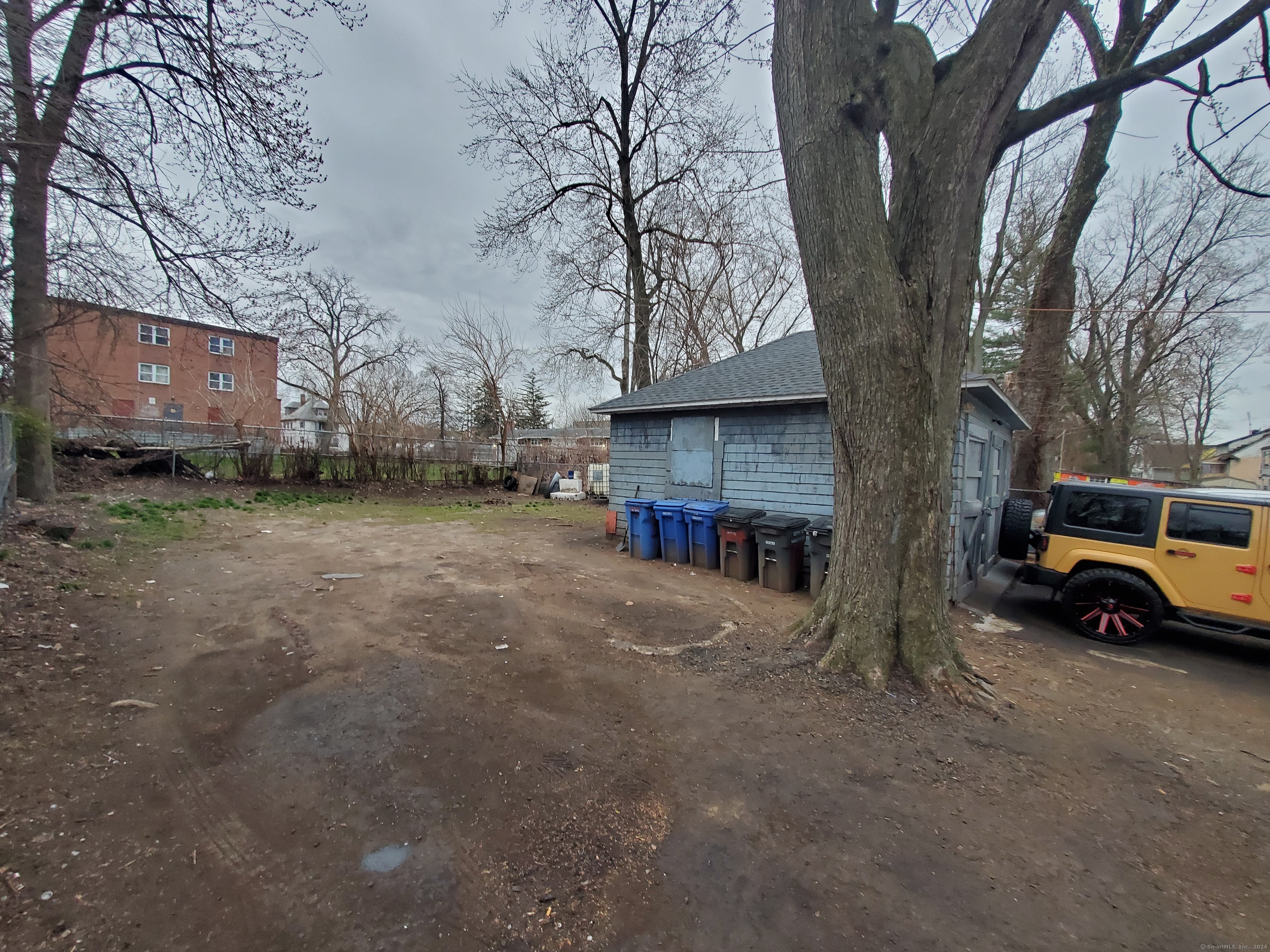164 Edgewood Street Hartford, CT 06112 - Photo 5 of 32 Backyard and garage