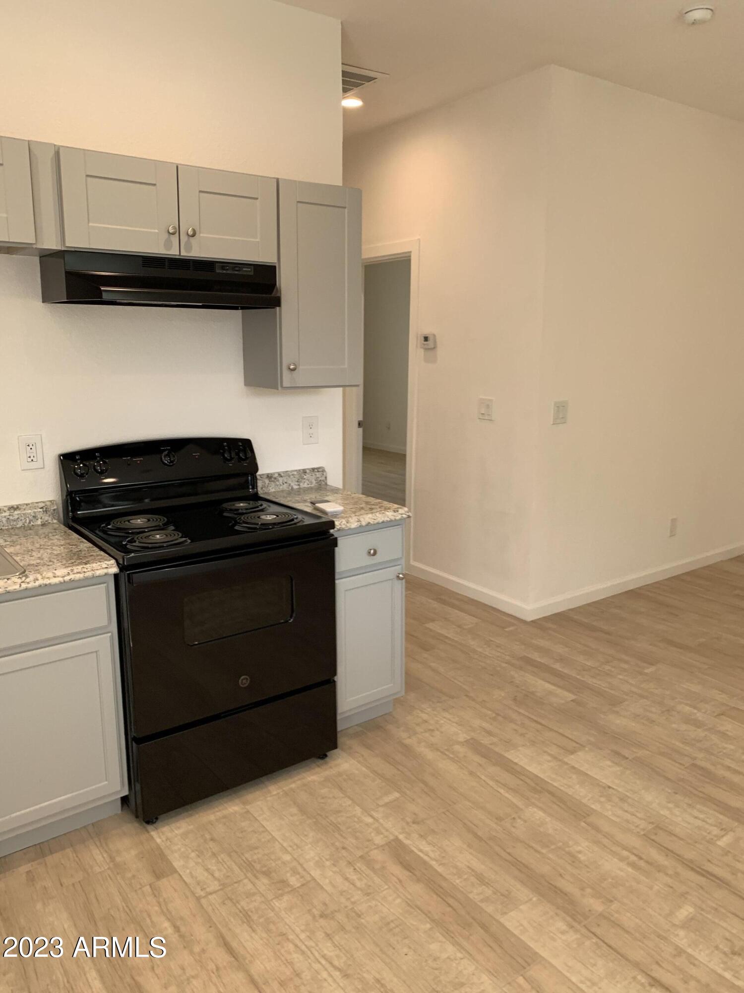 1759 West Hadley Street, Unit B Phoenix, AZ 85007 - Photo 6 of 11 IMG_9217