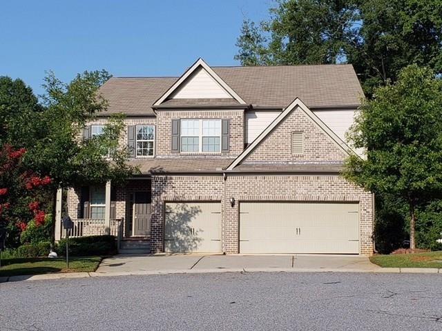 355 Fowler Springs Court Alpharetta, GA 30004 - Photo 1 of 16 front view of house with a yard