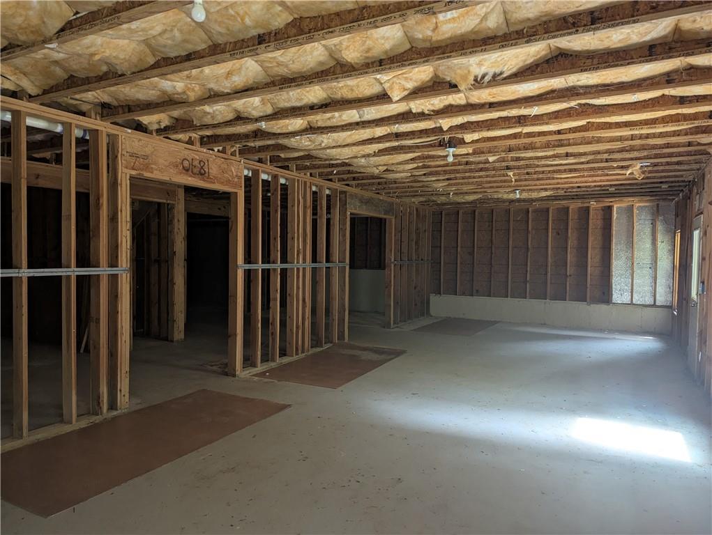 355 Fowler Springs Court Alpharetta, GA 30004 - Photo 13 of 16 a view of an empty room with wooden walls